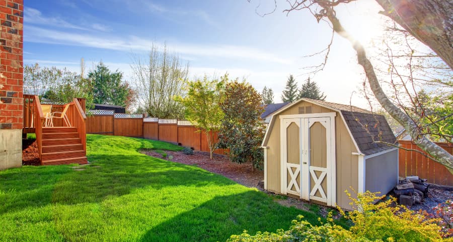 Fenced backyard with storage shed in Lynchburg